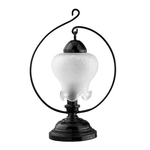 Hanging frosted tulip shade in black curled base table lamp.