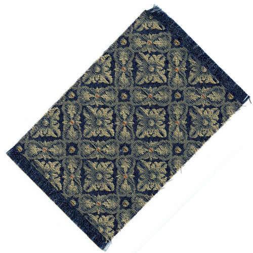 Brocade patterned blue and creamy gold rug