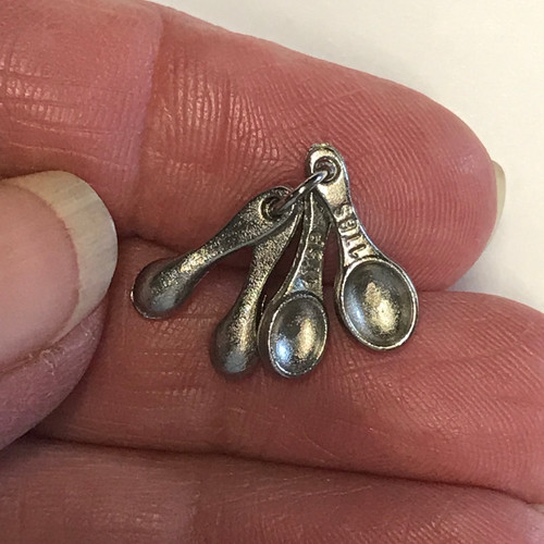 Miniature Measuring Spoons (IM65616) in hand