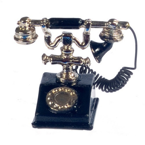 Image of black and gold French style telephone