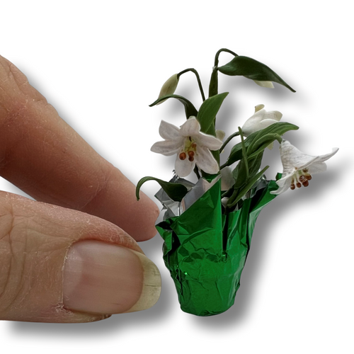 Easter Lilies in Pot (UFN3020) with hand for scale
