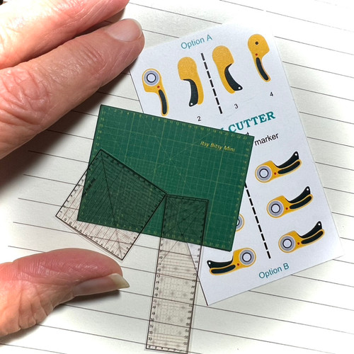 Rotary cutter, ruler, and cutting mat 