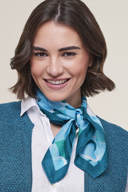 close up of model wearing Hearts Whisper Silk Scarf 