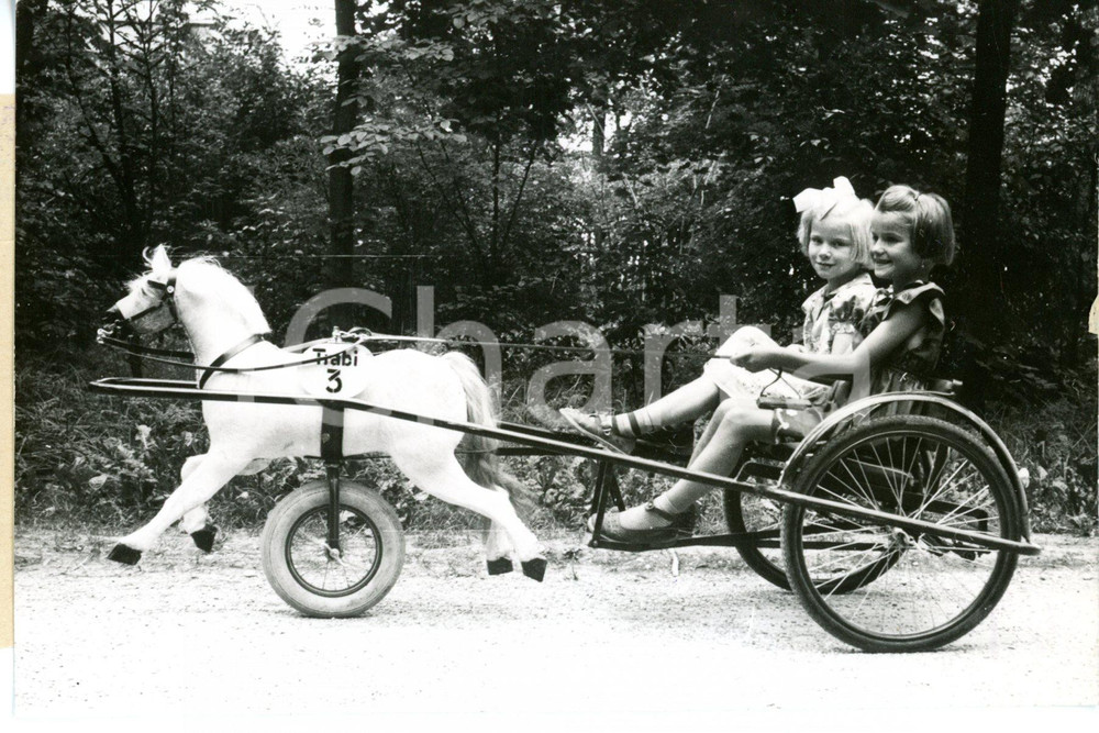 1953 COSTUME Two young girls trotting on new toy vehicle "TRABI 3" *Photo 15x10