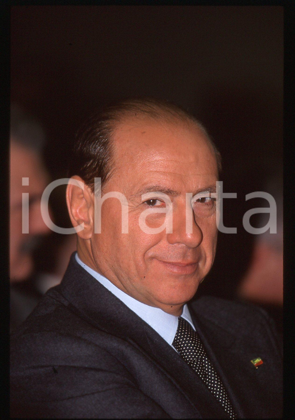Silvio BERLUSCONI - Convegno ALLEANZA NAZIONALE 1995 ca * 35 mm vintage slide 62  Diapositiva d'epoca, in formato 35 mm.CONDIZIONI: GOODE' severamente vietata la riproduzione. Tutti i diritti sono riservati.ICharta mette in vendita, sul negozio eBay e in esclusiva sul sito "icharta" il proprio archivio composto da numerose diapositive e negativi fotografici d'epoca, tutti originali e autentici, che attraversano la storia del costume italiano tra gli la fine degli anni Sessanta e Novanta.Si tratta di uno sguardo inedito sull'attualità, la politica, la vita quotidiana, il gossip e la cultura, che fotografa il cambiamento della nazione in quest'ultimo scorcio del XX secolo. Un'occasione unica per il mercato del collezionismo, che vede finalmente disponibile un archivio eccezionale per vastità, tematiche e condizioni, in un settore (il negativo fotografico e la diapositiva) di assoluta novità e dalle interessanti prospettive di investimento.  GOOD/buono   originale e autentica 1