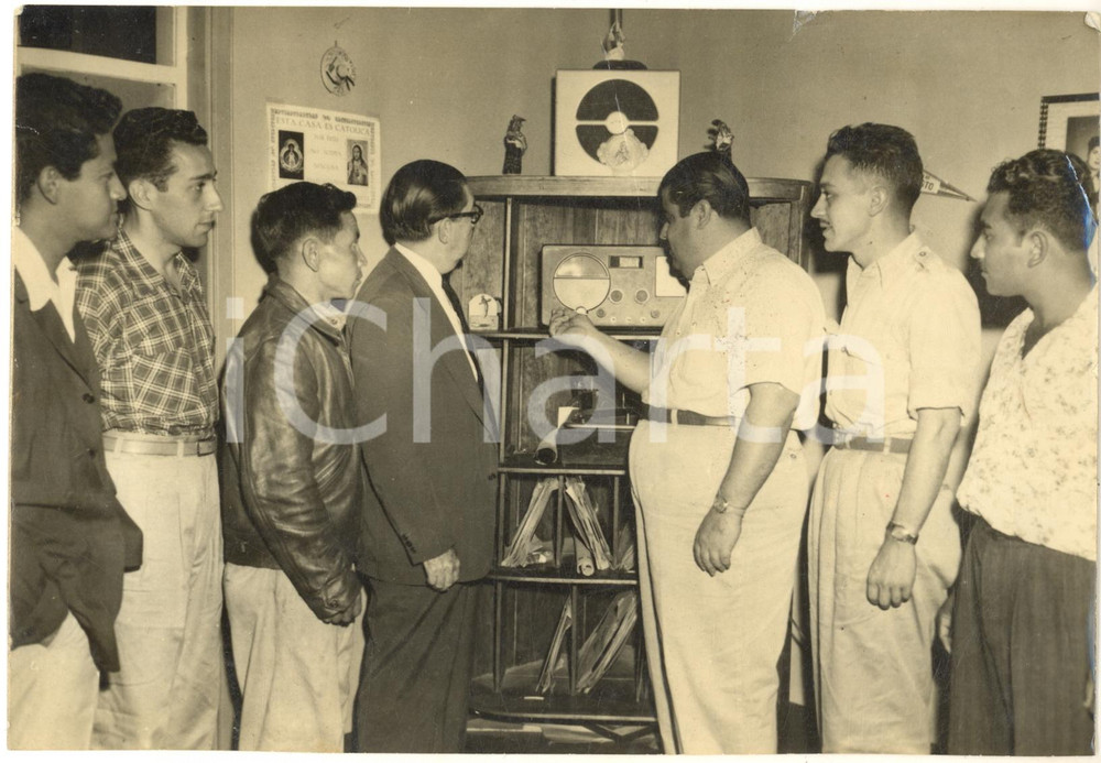 1954 TEGUCIGALPA HONDURAS Rebels at Revolutionary Army Liason Office hear radio