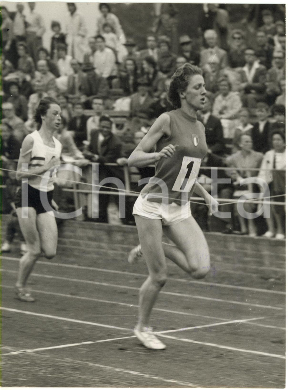 1958 BRIGHTON Sports Arena - Giuseppina LEONE taglia il traguardo dei 100 metri