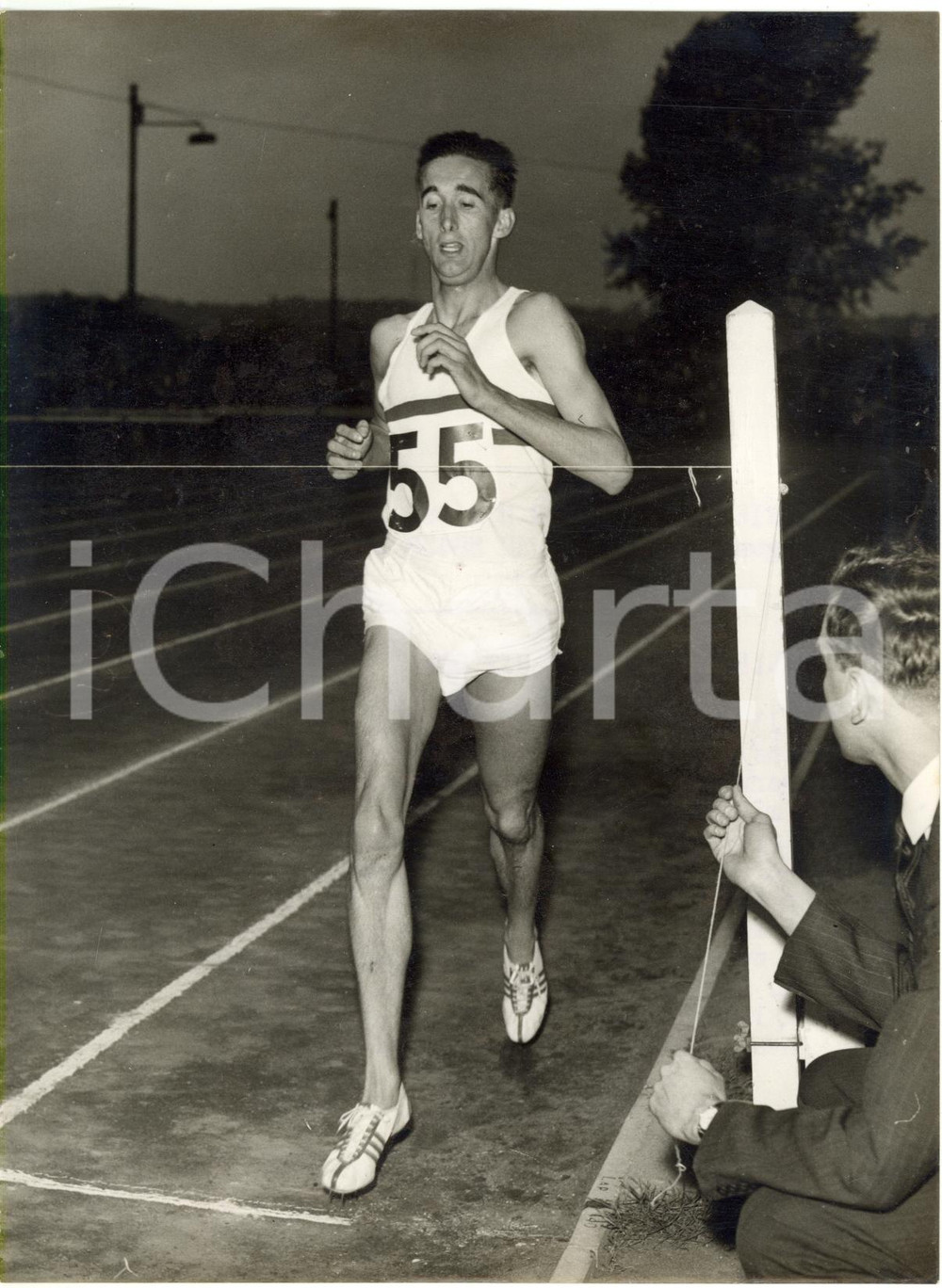 1956 LONDON Croydon Sports Arena - Gordon PIRIE wins the two miles event *Photo