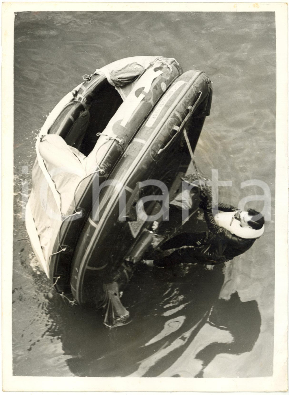1954 SOUTHAMPTON William HARVEY shows an unsinkable dinghy at King George V Dock