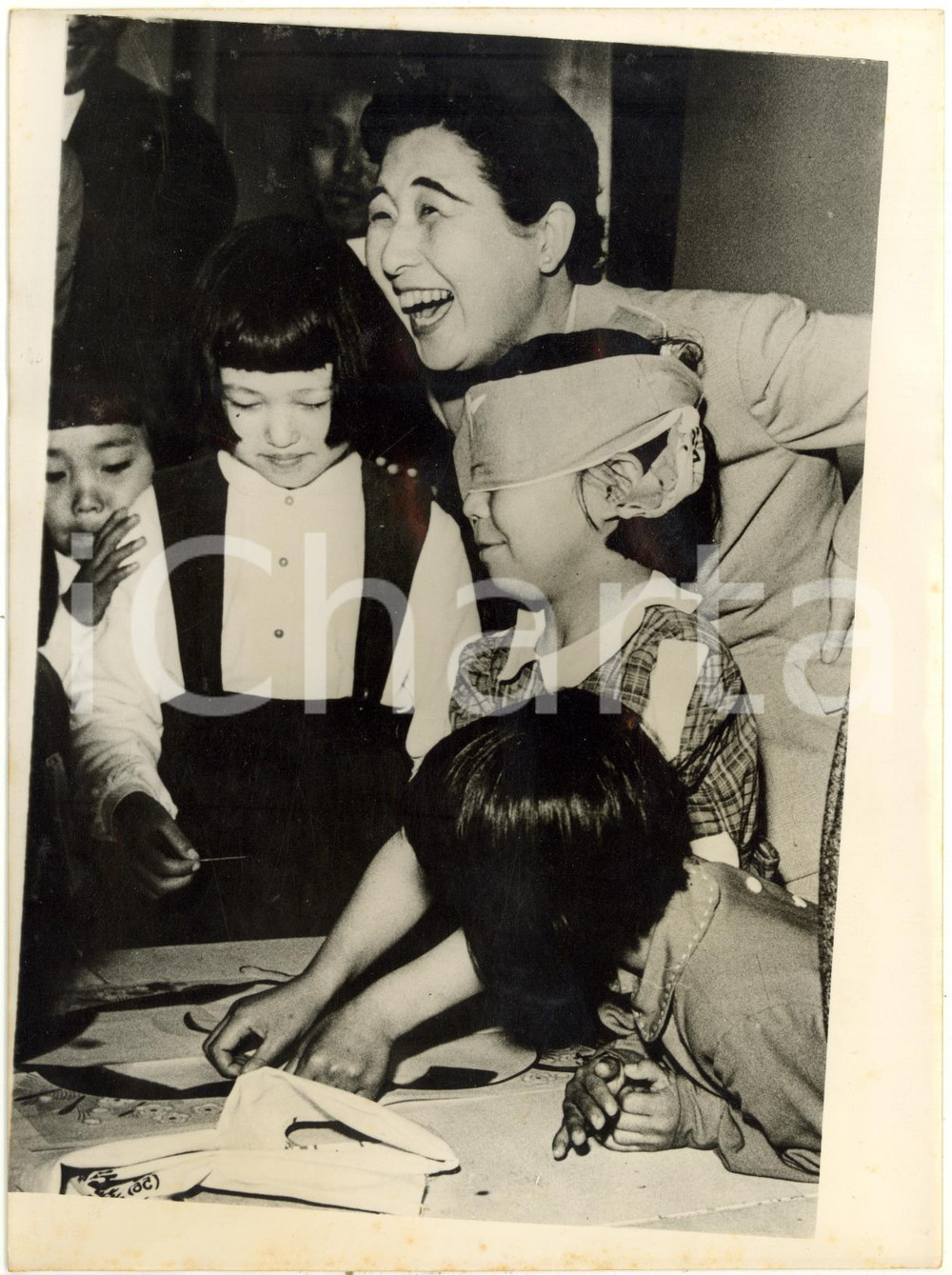 1954 NARITA Korinkaku Hall - Princess TAKAMATSU plays with a group of orphans