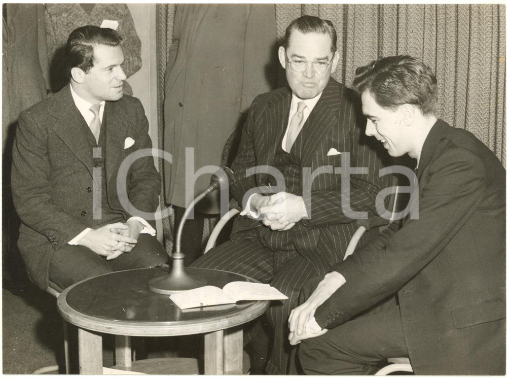 1957 LONDON AIRPORT - Ambassador John Hay WHITNEY holding a press conference