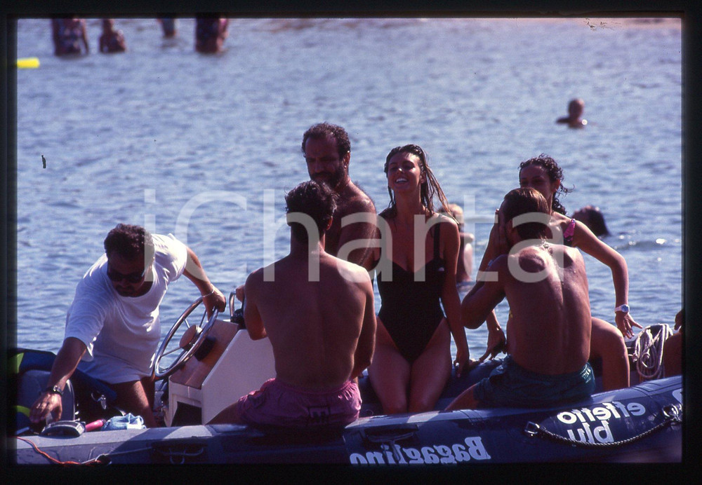 35mm vintage slide*1992 COSTA SMERALDA Giobbe COVATTA  paparazzato sul gommone 