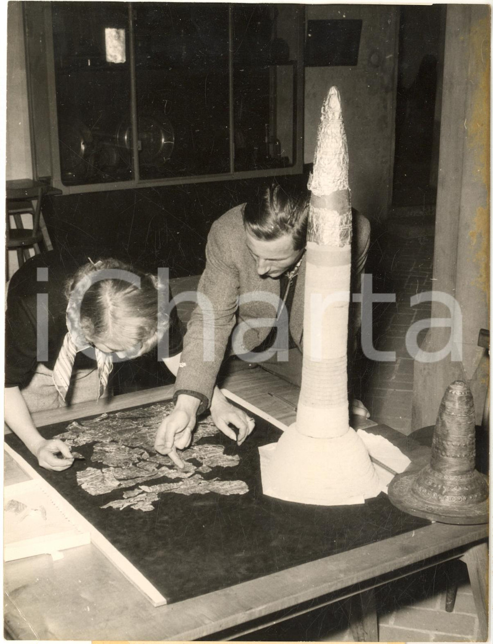 1953 NUREMBERG Miss RAUM working on the ancient "Nuremberg Gold Helmet" *Photo