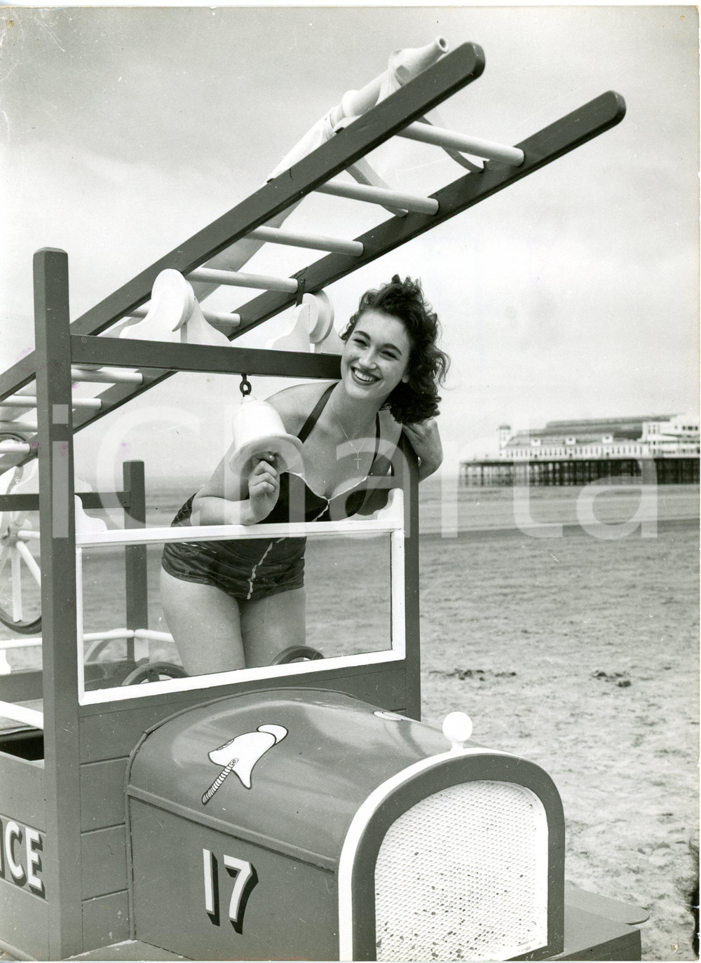 1958 WESTON-SUPER-MARE (SOMERSET) Ann BILHAM on a police sand fire engine *Photo