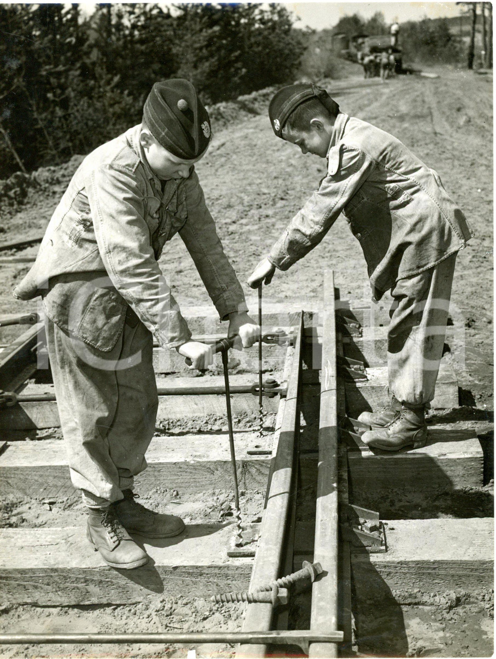 1954 LONGMOOR MILITARY CAMP - Gordon Boys cadets drilling holes on railway track