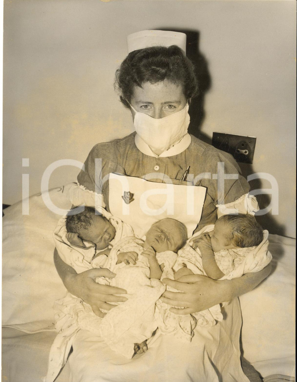 1959 LONDON Queen Charlotte's Hospital - Nurse holding new babies on January 1st