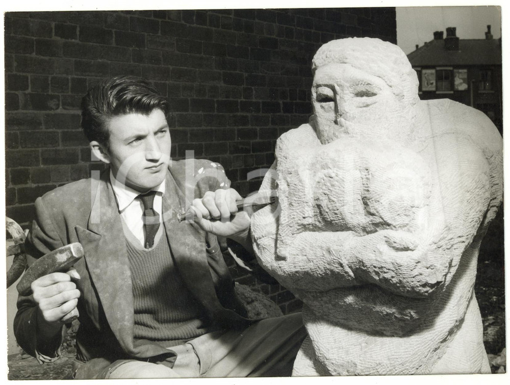1960 ROCHDALE (UK) Sculptor Peter NICHOLSON working on "Christ as Good Shepherd"