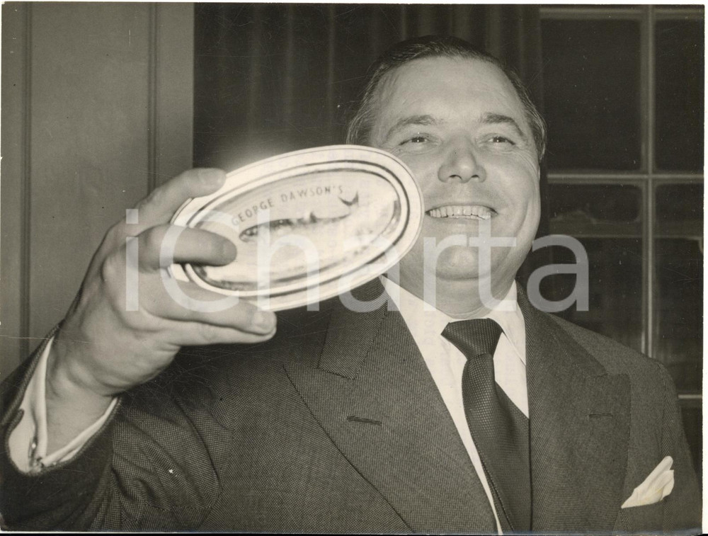 1954 LONDON Millionaire George DAWSON holding up a tin of his pilchards *Photo