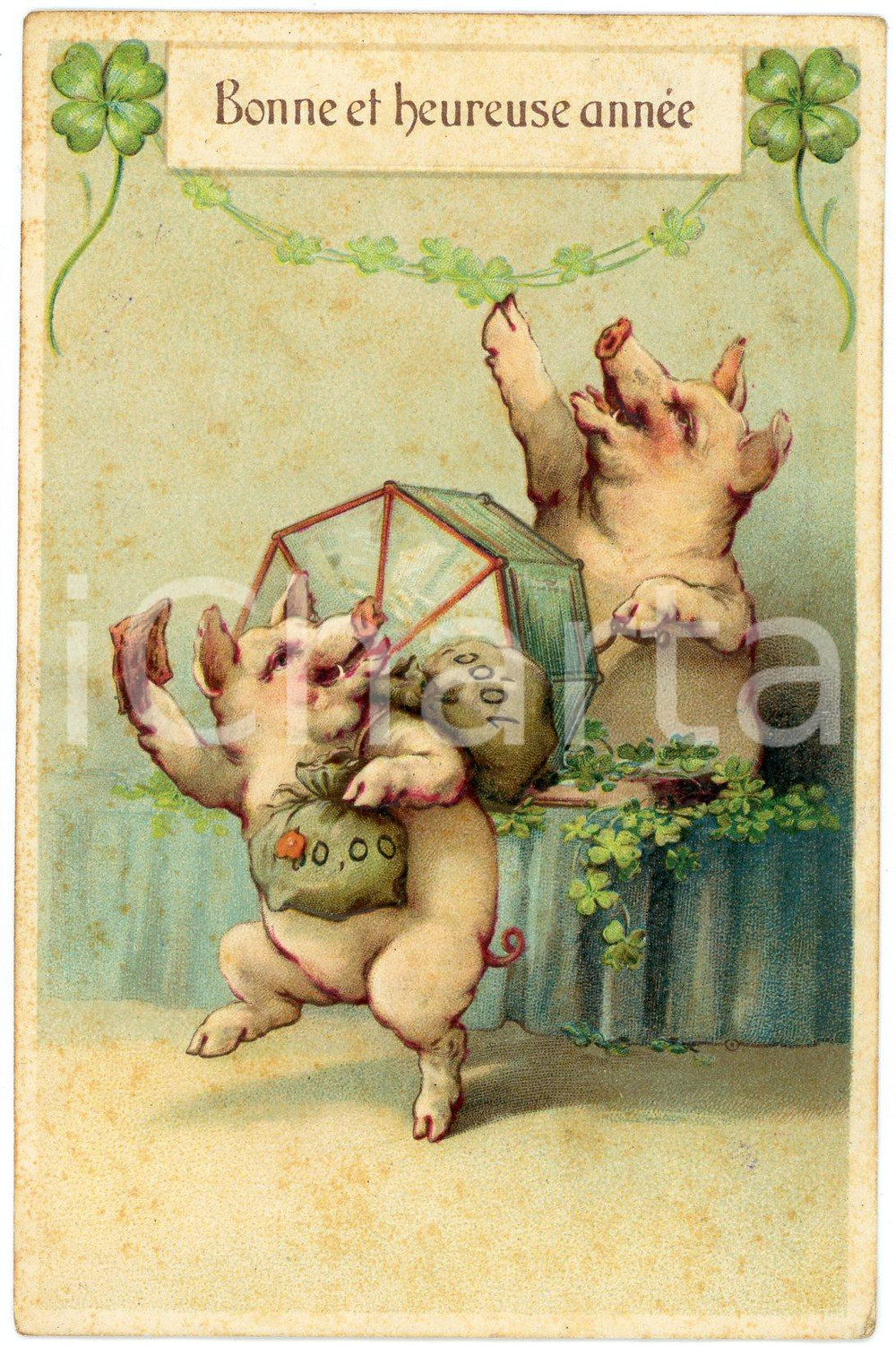 1913 BONNE ET HEUREUSE ANNÉE Pigs playing the lottery - Embossed Postcard FP  Cartolina postale d'epoca, viaggiata ma con affrancatura parzialmente rimossa. POOR/danneggiato Lievi smussature agli angoli, bruniture diffuse e abrasioni in corrispondenza dell'affrancatura rimossa. Formato: FP originale e autentica 1