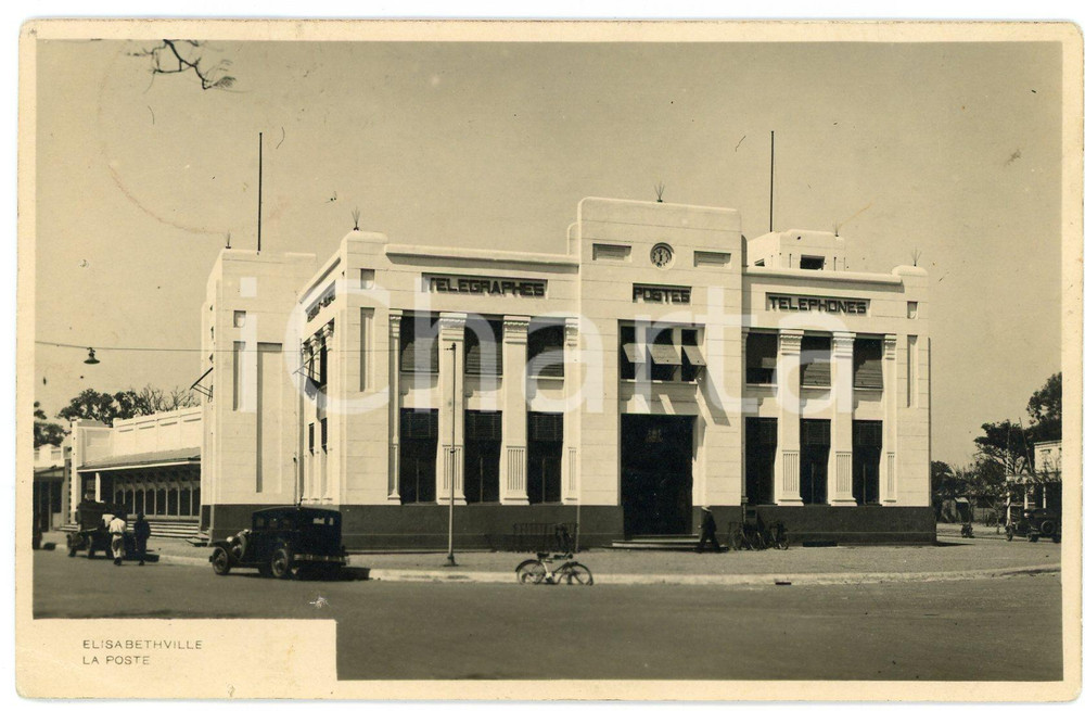 1934 ELISABETHVILLE (CONGO BELGE) La Poste - Photo Léopold GABRIEL 14x9 cm Fotografia originale d'epoca, in formato cartolina postale, viaggiata (ma francobollo distaccato)FOTOGRAFO: L&eacute;opold Gabriel FAIR/discreto lievi piegature angolari e al lato superiore Formato: 14x9 cm originale e autentica 1