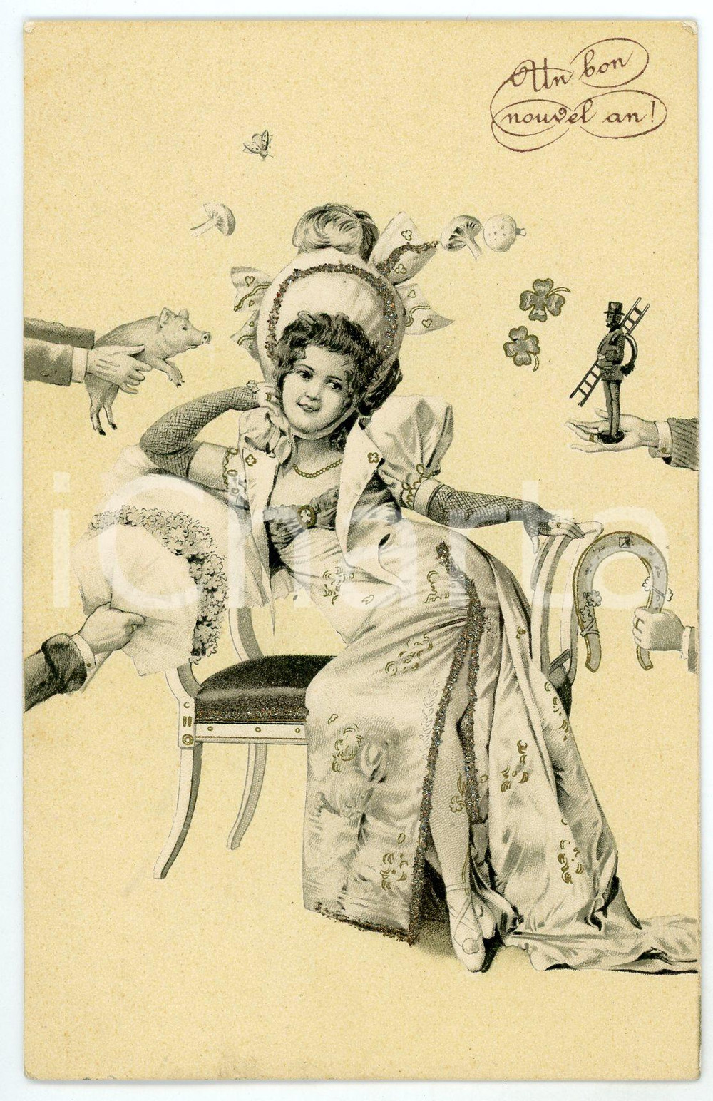 1904 BONNE ANNÉE Woman sitting in a sofa with good luck sign *Glittered postcard  Cartolina postale d'epoca, viaggiata, in rilievo.CONDIZIONI: G FORMATO: FP    originale e autentica 1
