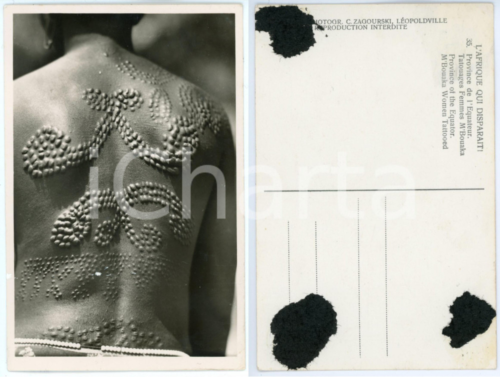 1930 C. ZAGOURSKI Â«L'Afrique qui disparaÃ®tÂ»  Tatouages femmes M'BOUAKA - n.35  Fotocartolina postale d'epoca, appartenente alla 2^ serie &laquo;L'Afrique qui dispara&icirc;t&raquo; del fotografo Casimir Zagourski (L&eacute;opoldville).N&deg; 35, non viaggiata.CONDIZIONI: FAIR (residui cartacei al verso)FORMATO: 9x14 cm     originale e autentica 1