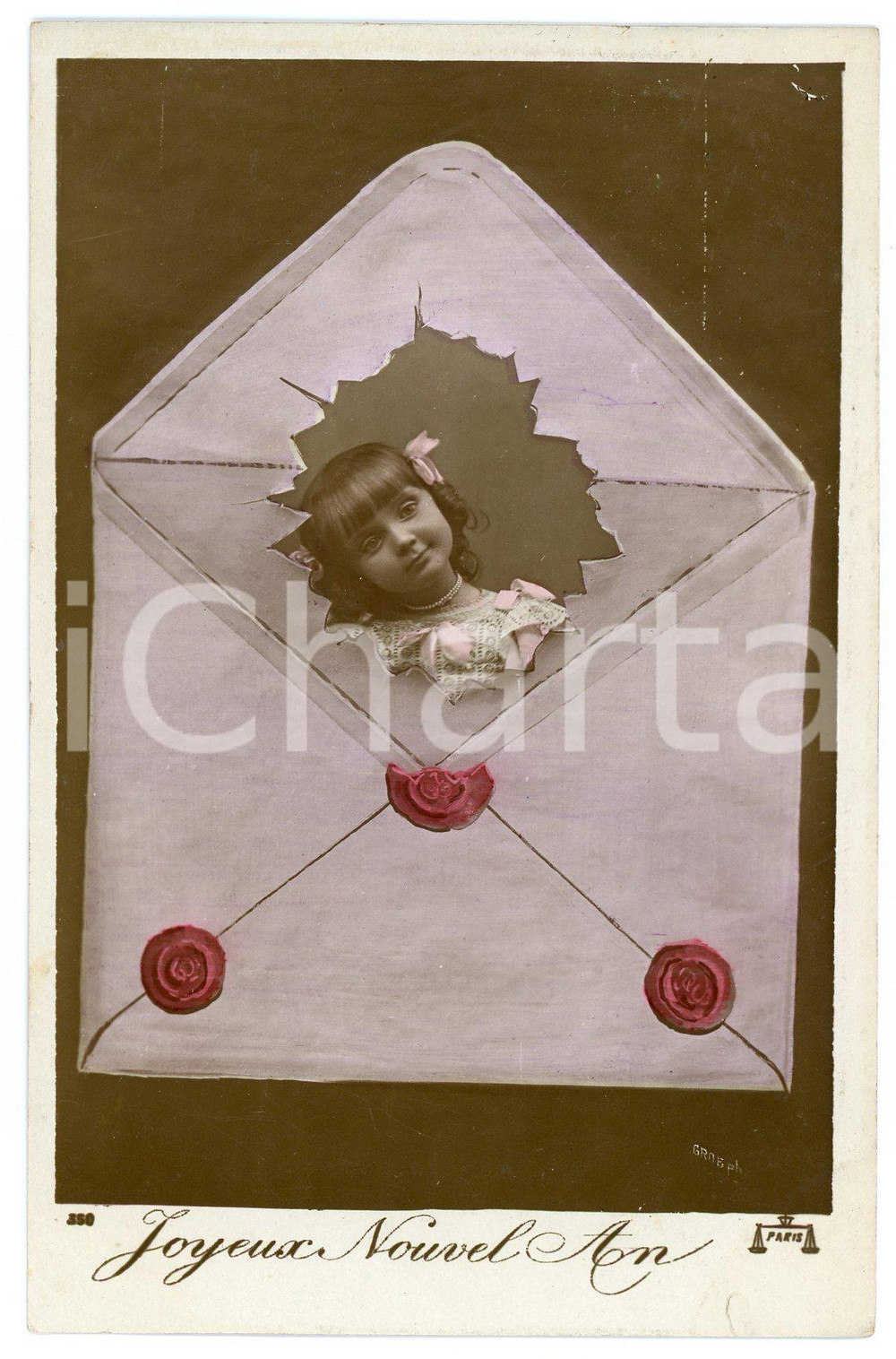 1911 BONNE ANNEE Child in an envelope - Vintage postcard  Cartolina postale d'epoca, viaggiata.CONDIZIONI: F (macchia al verso; rigonfiamento centrale; lieve piegatura al margine superiore)FORMATO: FP    originale e autentica 1