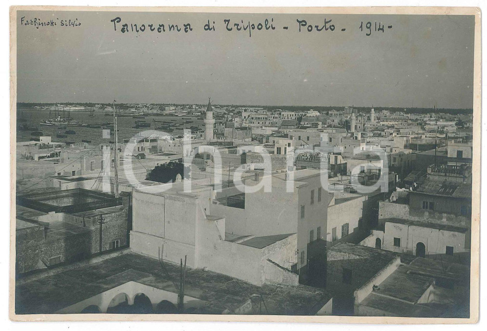 1914 TRIPOLI (LIBIA ITALIANA) Panorama - Porto - Fotografia Fotografia d'epoca, con didascalia manoscritta al recto.FOTOGRAFO: Silvio Fachinotti FAIR/discreto residui di carta e di colla al verso Formato: 17x11 cm originale e autentica 1