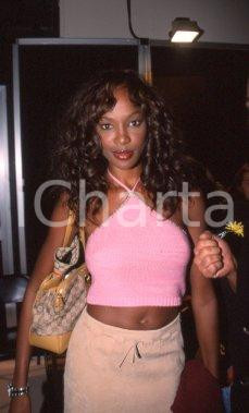 35mm vintage slide* 2000ca MILANO top model Youma DIAKITE ritratto (8) Diapositiva d'epoca, in formato 35 mm. CONDIZIONI: GOOD Tutti i diritti riservati E' severamente vietata la riproduzione.  ICharta mette in vendita, sul negozio eBay e in esclusiva sul sito "icharta" il proprio archivio composto da numerose diapositive e negativi fotografici d'epoca, tutti originali e autentici, che attraversano la storia del costume italiano tra gli la fine degli anni Sessanta e Novanta.Si tratta di uno sguardo inedito sull'attualit&agrave;, la politica, la vita quotidiana, il gossip e la cultura, che fotografa il cambiamento della nazione in quest'ultimo scorcio del XX secolo. Un'occasione unica per il mercato del collezionismo, che vede finalmente disponibile un archivio eccezionale per vastit&agrave;, tematiche e condizioni, in un settore (il negativo fotografico e la diapositiva) di assoluta novit&agrave; e dalle interessanti prospettive di investimento.  CONDIZIONI:GOOD/buono originale e autentica 1