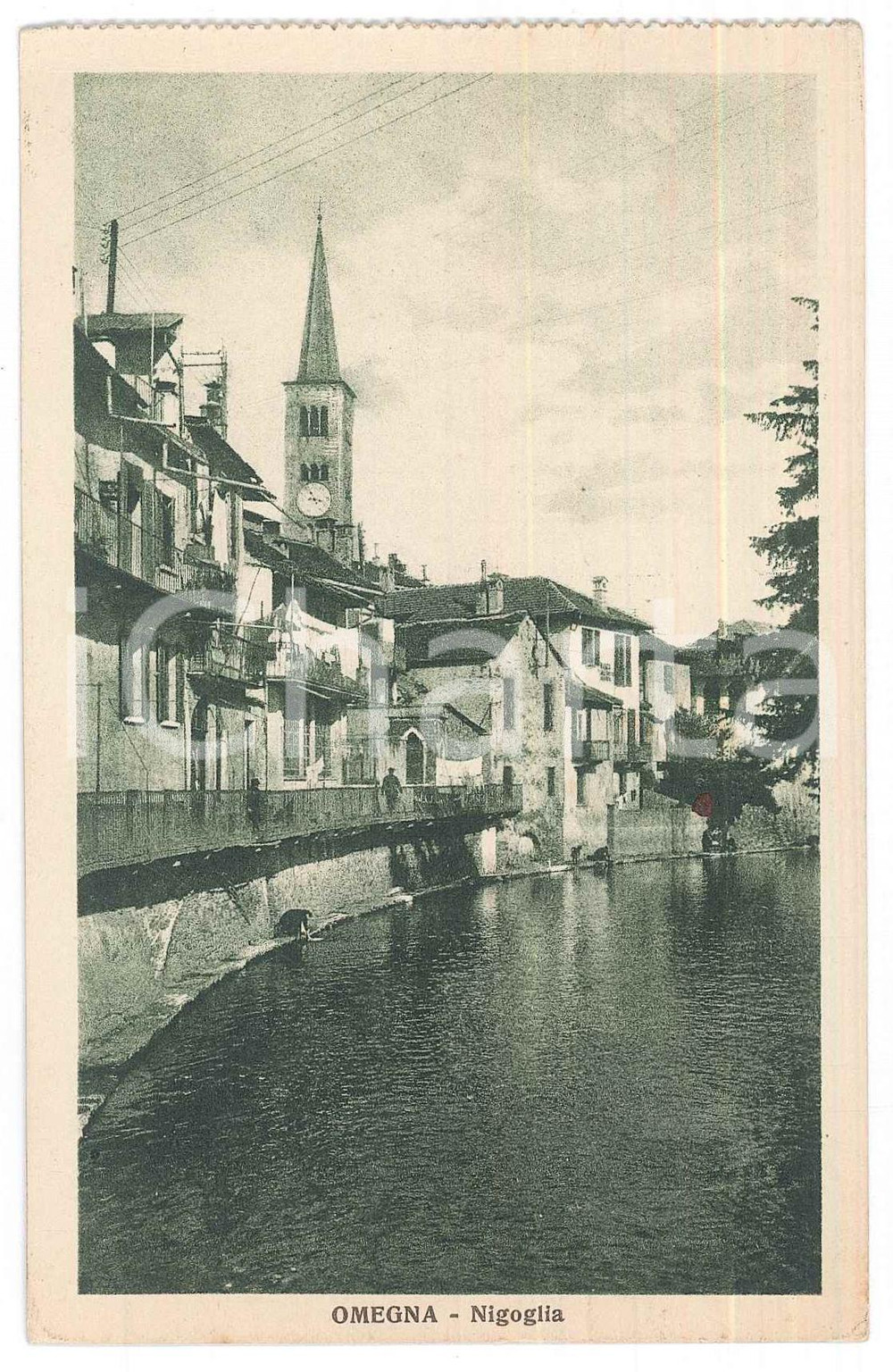 1941 OMEGNA (VCO) Veduta con il torrente Nigoglia *Cartolina ANIMATA FP VG  Cartolina postale d'epoca, viaggiata.Correttore apposto al verso sul nome del destinatario. GOOD/buono  Formato: 9x14 cm originale e autentica 1