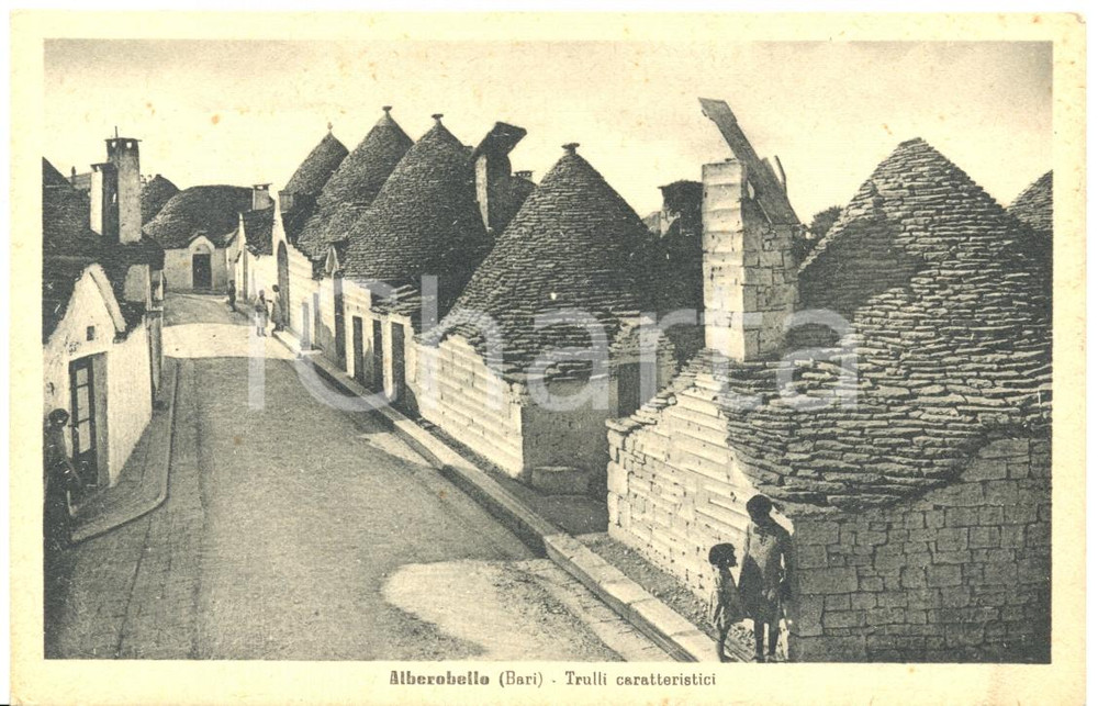 Cartolina originale da collezione 1949 ALBEROBELLO BA Strada con trulli Cartolina ANIMATA FP VG 1