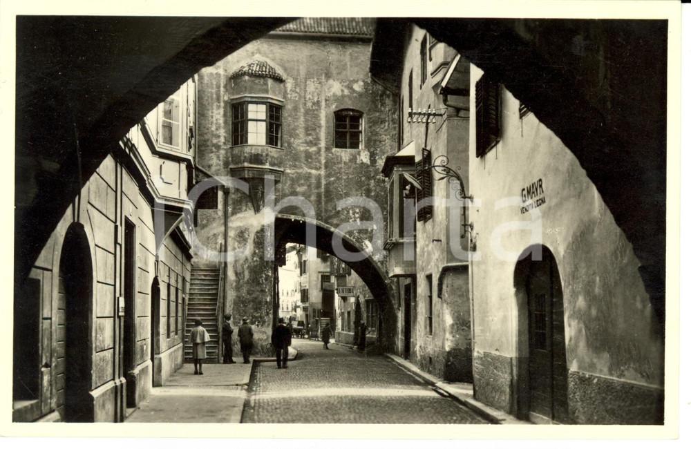 Cartolina originale da collezione 1940 ca BOLZANO Veduta di una via con G.MAYR vendita legna Cartolina FP NV 1