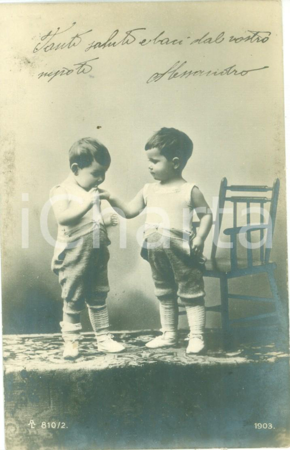 Cartolina originale da collezione 1903 INFANZIA Bambini giocano vicino a una sedia a dondolo Cartolina FP VG 1