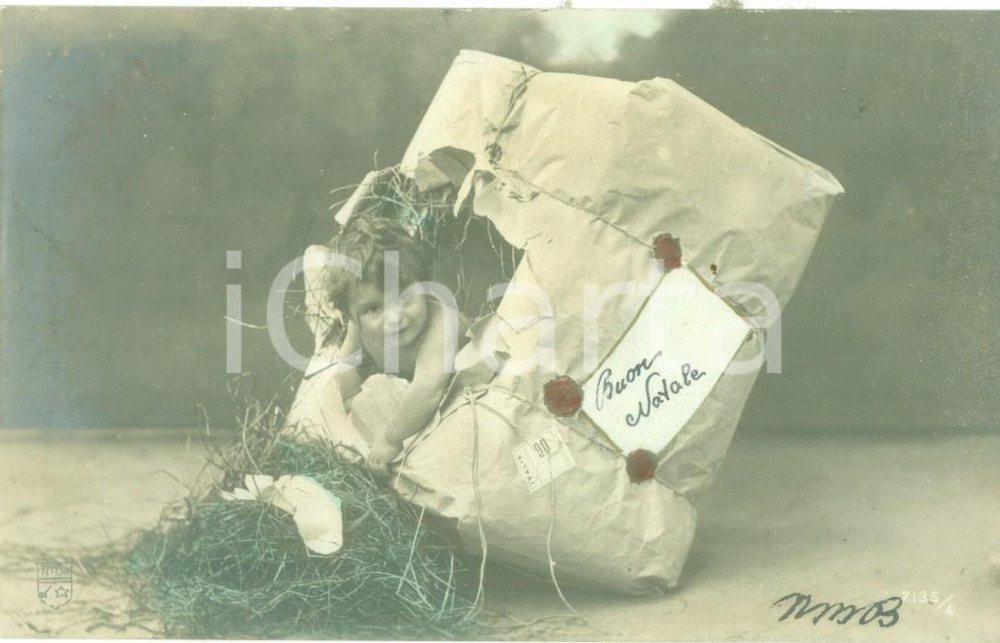 Cartolina originale da collezione 1907 BUON NATALE Bambino esce da un pacco regalo Cartolina FP VG 1