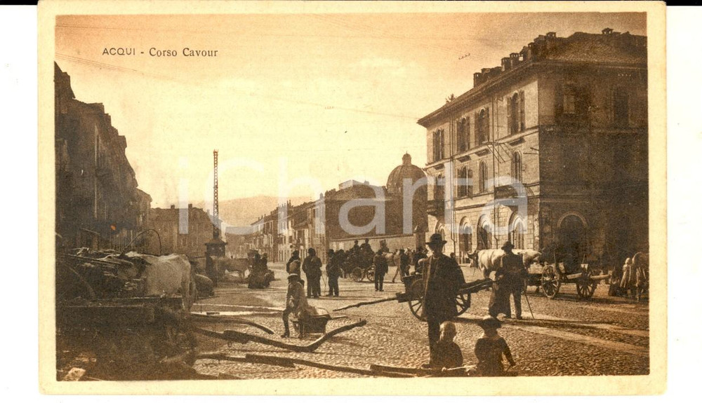 Cartolina originale da collezione 1915 ca ACQUI TERME Corso CAVOUR Cartolina ANIMATISSIMA carretti e buoi 1