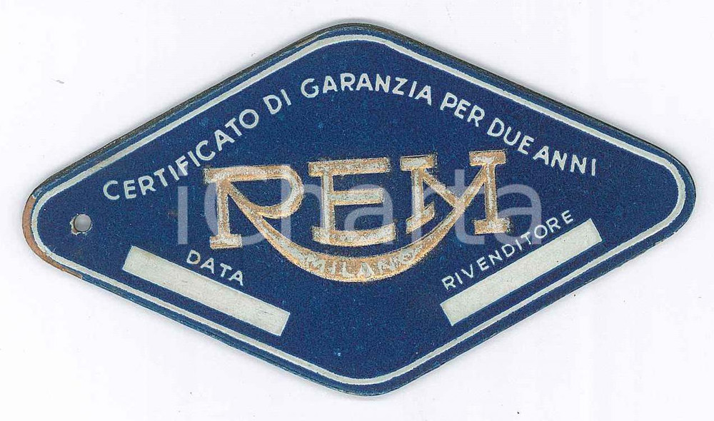 Materiale pubblicitario d’epoca 1951 MILANO Ditta REM  Targhetta metallica  Garanzia 10x5 cm 1