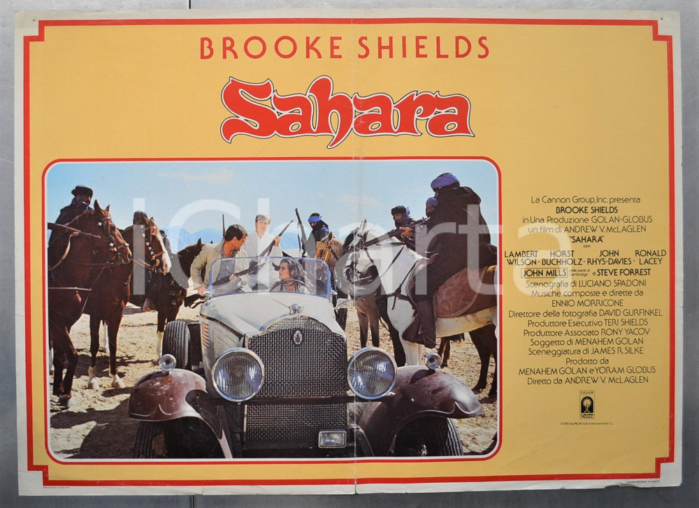 Materiale cinematografico d’epoca 1983 SAHARA Brooke SHIELDS Lambert WILSON Horst BUCHHOLZ Fotobusta 66x46 cm 1
