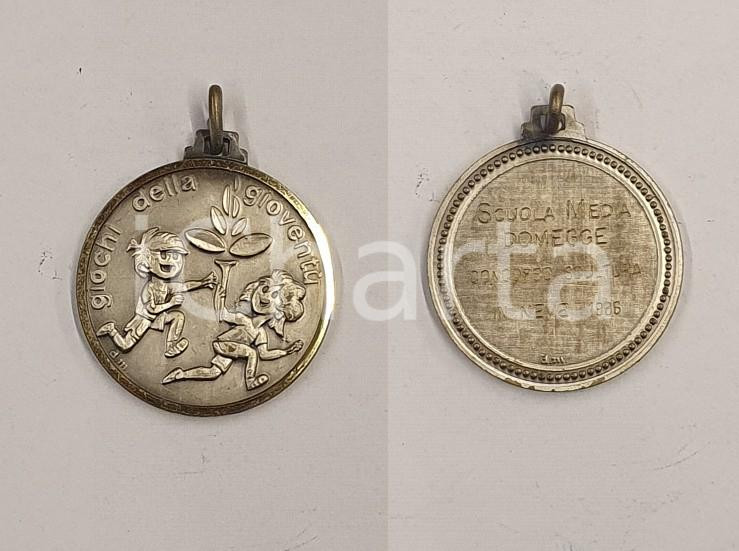1985 DOMEGGE Giochi della gioventù Concorso scultura in neve  Medaglia 3x3 cm 1