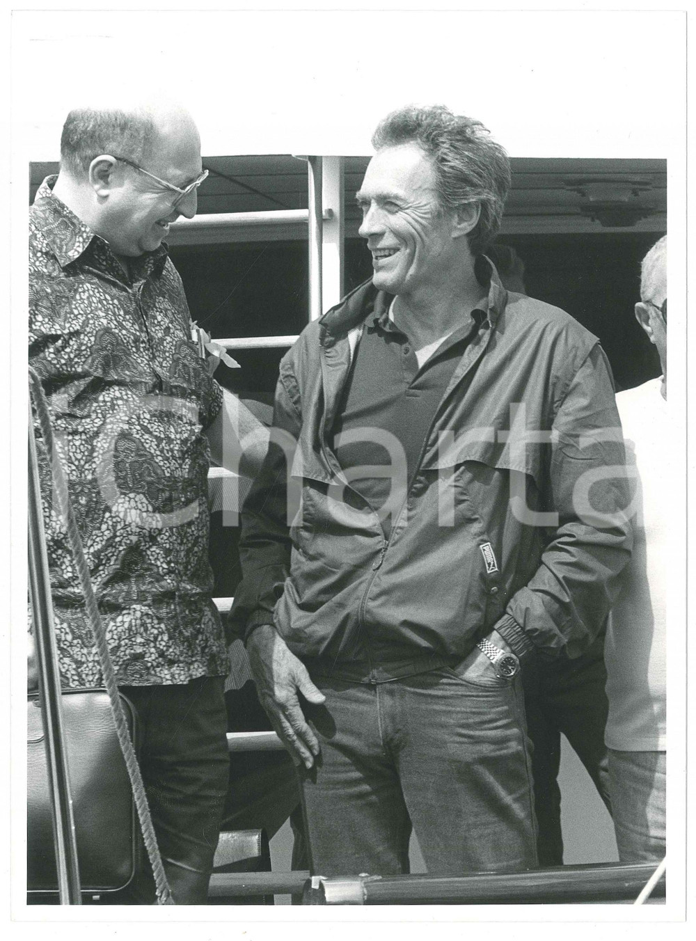 Materiale cinematografico d’epoca 1985 ca COSTUME Clint EASTWOOD in barca  Fotografia 24x18 cm 1 1