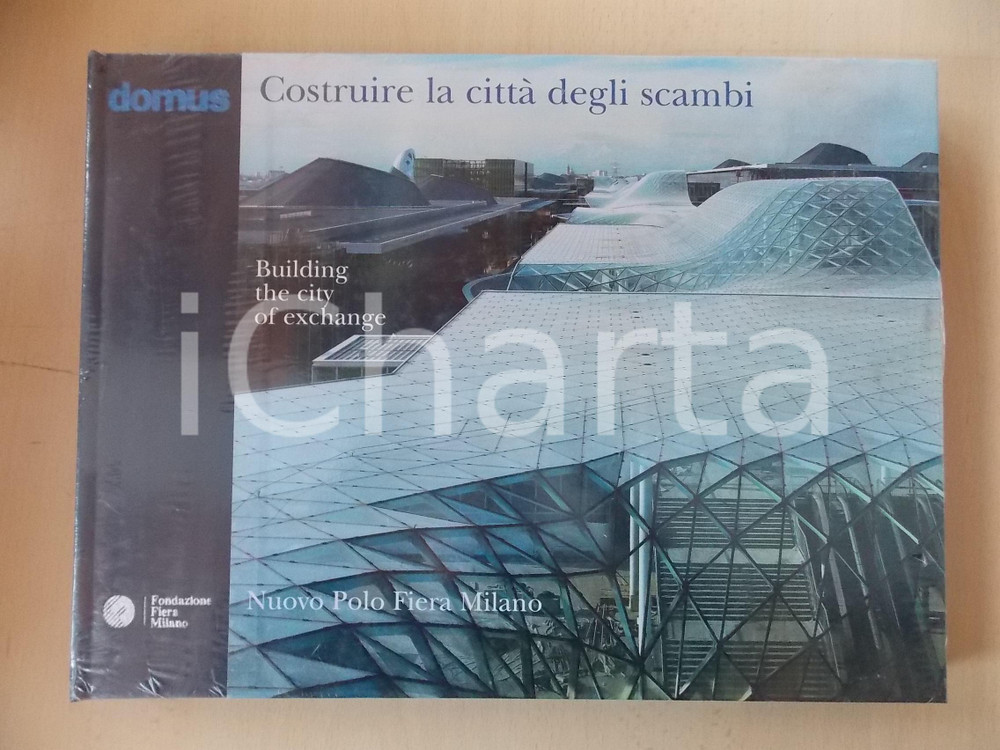 2005 Massimiliano FUKSAS Costruire la cittÃ  degli scambi - Polo Fiera Milano  EDITORE: Domus - MilanoDIMENSIONI: 33x25 cmPAGINE: 228 CONDIZIONI: G    originale e autentica 1