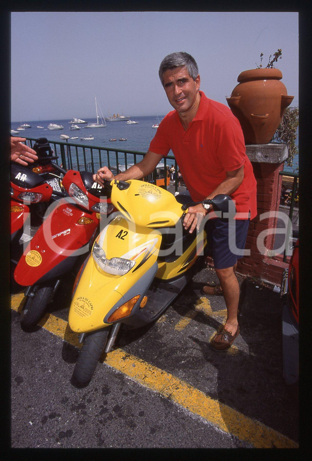 35mm vintage slide* 1999 CAPRI Pier Ferdinando CASINI noleggia uno scooter