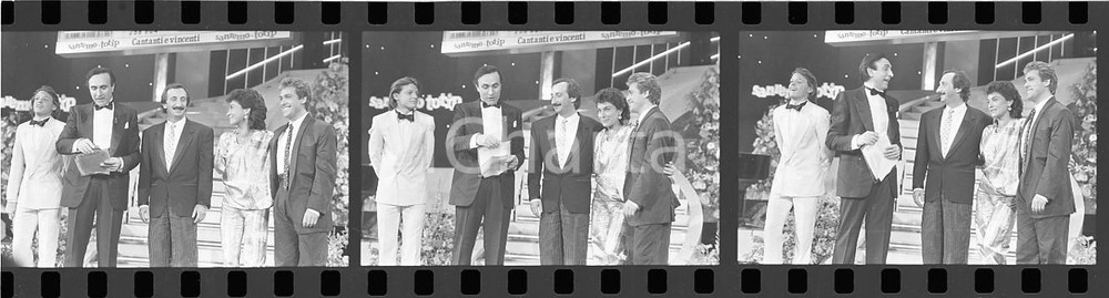 35mm LOTTO 3 NEGATIVI * 1985 SANREMO Pippo BAUDO Luis MIGUEL RICCHI E POVERI (2) Fotografie realizzate sul palco dell'Ariston presente anche Luis Miguel.Negativo originale in bianco e nero (su pellicola), in formato 35mm CONDIZIONI:  GOODE' severamente vietata la riproduzione. Tutti i diritti sono riservati. ICharta mette in vendita, sul negozio eBay e in esclusiva sul sito "icharta" il proprio archivio composto da numerose diapositive e negativi fotografici d'epoca, tutti originali e autentici, che attraversano la storia del costume italiano tra gli la fine degli anni Sessanta e Novanta.Si tratta di uno sguardo inedito sull'attualit&agrave;, la politica, la vita quotidiana, il gossip e la cultura, che fotografa il cambiamento della nazione in quest'ultimo scorcio del XX secolo. Un'occasione unica per il mercato del collezionismo, che vede finalmente disponibile un archivio eccezionale per vastit&agrave;, tematiche e condizioni, in un settore (il negativo fotografico e la diapositiva) di assoluta novit&agrave; e dalle interessanti prospettive di investimento.  originale e autentica 1