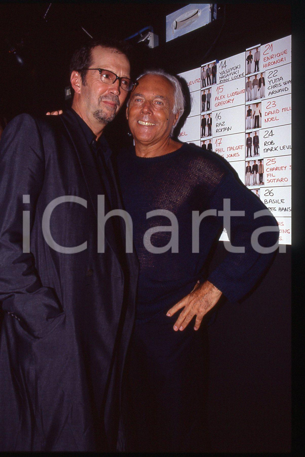 Giorgio ARMANI ed Eric CLAPTON - MODA 1995 ca * 35 mm vintage slide 5  Diapositiva d'epoca, in formato 35 mm.Per i diritti rivolgersi a ICharta.E' severamente vietata la riproduzione. Tutti i diritti sono riservati.Nella diapositiva ICharta mette in vendita, sul negozio eBay e in esclusiva sul sito "icharta" il proprio archivio composto da numerose diapositive e negativi fotografici d'epoca, tutti originali e autentici, che attraversano la storia del costume italiano tra gli la fine degli anni Sessanta e Novanta.Si tratta di uno sguardo inedito sull'attualit&agrave;, la politica, la vita quotidiana, il gossip e la cultura, che fotografa il cambiamento della nazione in quest'ultimo scorcio del XX secolo. Un'occasione unica per il mercato del collezionismo, che vede finalmente disponibile un archivio eccezionale per vastit&agrave;, tematiche e condizioni, in un settore (il negativo fotografico e la diapositiva) di assoluta novit&agrave; e dalle interessanti prospettive di investimento.  GOOD/buono   originale e autentica 1