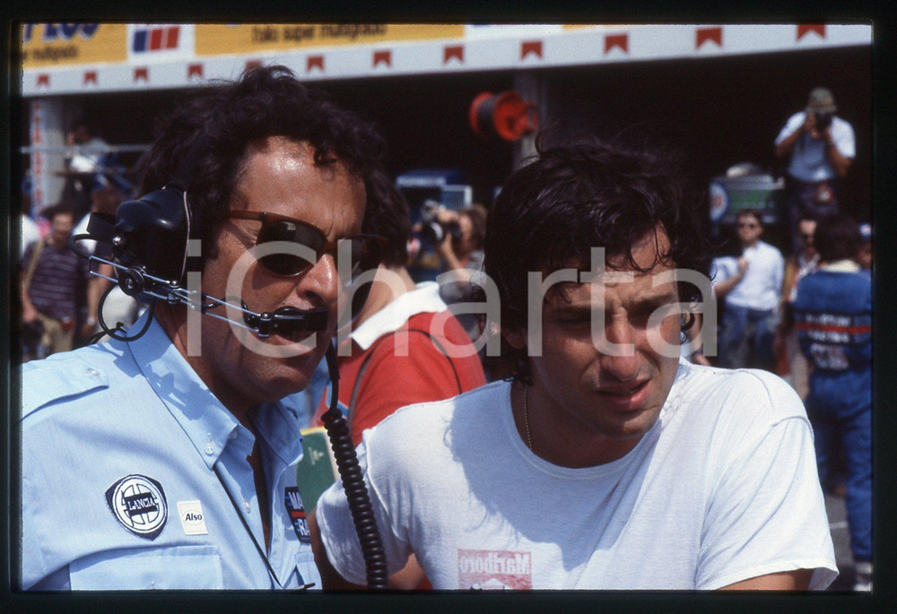 35mm vintage slide* 1984 1000 KM MONZA Cesare FIORIO con Riccardo PATRESE   Diapositiva d'epoca, in formato 35 mm. CONDIZIONI: GOODTutti i diritti riservati.E' severamente vietata la riproduzione. ICharta mette in vendita, sul negozio eBay e in esclusiva sul sito "icharta" il proprio archivio composto da numerose diapositive e negativi fotografici d'epoca, tutti originali e autentici, che attraversano la storia del costume italiano tra gli la fine degli anni Sessanta e Novanta.Si tratta di uno sguardo inedito sull'attualit&agrave;, la politica, la vita quotidiana, il gossip e la cultura, che fotografa il cambiamento della nazione in quest'ultimo scorcio del XX secolo. Un'occasione unica per il mercato del collezionismo, che vede finalmente disponibile un archivio eccezionale per vastit&agrave;, tematiche e condizioni, in un settore (il negativo fotografico e la diapositiva) di assoluta novit&agrave; e dalle interessanti prospettive di investimento.     originale e autentica 1