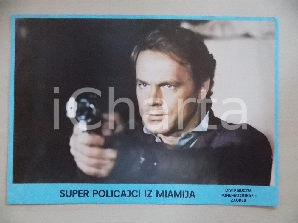 Materiale cinematografico d’epoca 1985 MIAMI SUPERCOPS Terence HILL punta una pistola Lobby card EDIZIONE CROATA 1