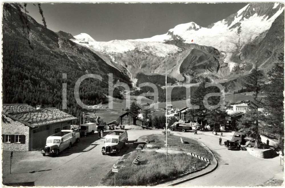 Cartolina originale da collezione 1932 SAAS FEE (CH) Veduta del parcheggio del paese *ANIMATA con autobus FP VG 1