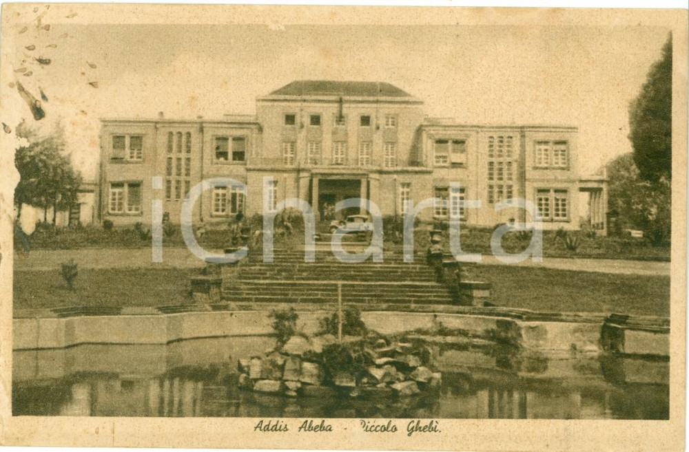 1936 ADDIS ABEBA (ETIOPIA) A.O.I. Piccolo Ghebì ANIMATA con auto Cartolina FP NV