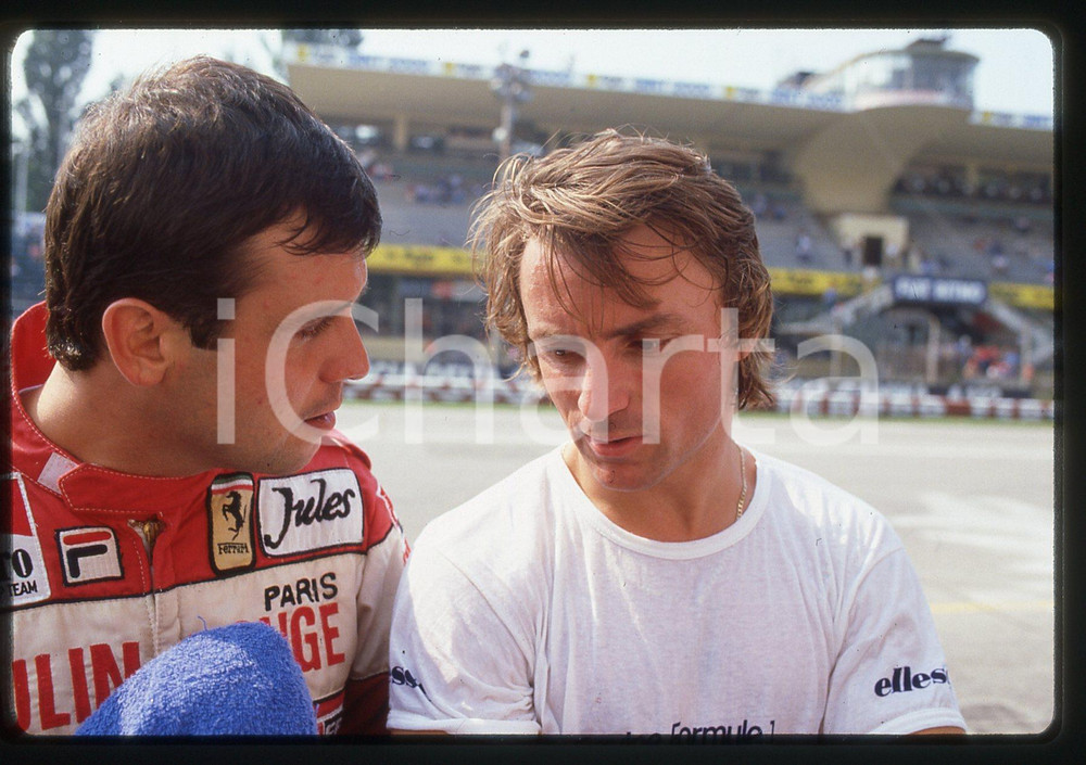 35mm vintage slide* 1982 GP MONZA Patrick TAMBAY e RenÃ¨ ARNOUX - Ritratto (6)   Diapositiva d'epoca, in formato 35 mm.CONDIZIONI: GOODTutti i diritti riservatiE' severamente vietata la riproduzione. ICharta mette in vendita, sul negozio eBay e in esclusiva sul sito "icharta" il proprio archivio composto da numerose diapositive e negativi fotografici d'epoca, tutti originali e autentici, che attraversano la storia del costume italiano tra gli la fine degli anni Sessanta e Novanta.Si tratta di uno sguardo inedito sull'attualit&agrave;, la politica, la vita quotidiana, il gossip e la cultura, che fotografa il cambiamento della nazione in quest'ultimo scorcio del XX secolo. Un'occasione unica per il mercato del collezionismo, che vede finalmente disponibile un archivio eccezionale per vastit&agrave;, tematiche e condizioni, in un settore (il negativo fotografico e la diapositiva) di assoluta novit&agrave; e dalle interessanti prospettive di investimento.  originale e autentica 1
