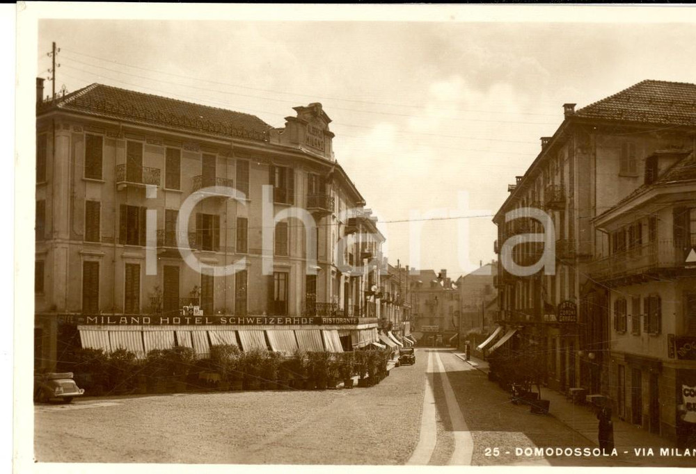Cartolina originale da collezione 1938 DOMODOSSOLA VB Via Milano Cartolina hotel SCHWEIZERHOF FP 1