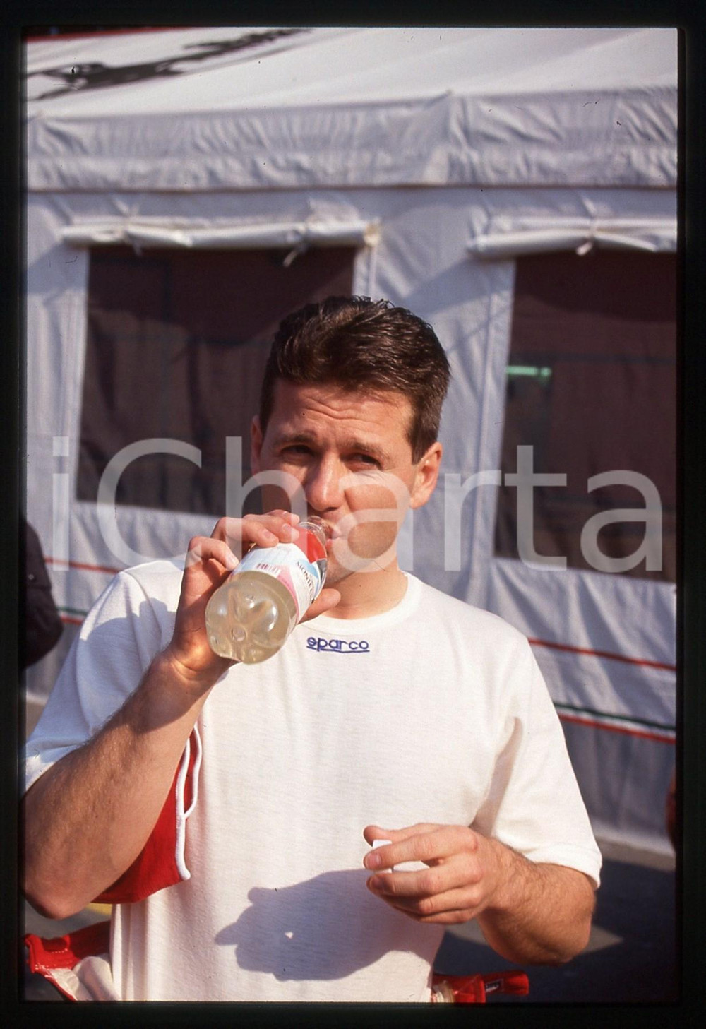 35mm vintage slide* 1994 GP SAN MARINO - Nicola LARINI si disseta nel paddock 5